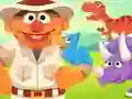 Cluiche 123 Sesame Street: Ernie's Dinosaur Day Care ar líne